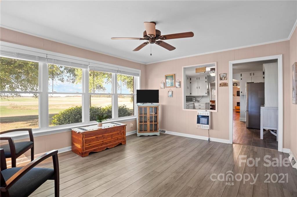 2125 Stack Road Monroe, NC 28112 - Photo 13 of 38 a living room with furniture large window and wooden floor