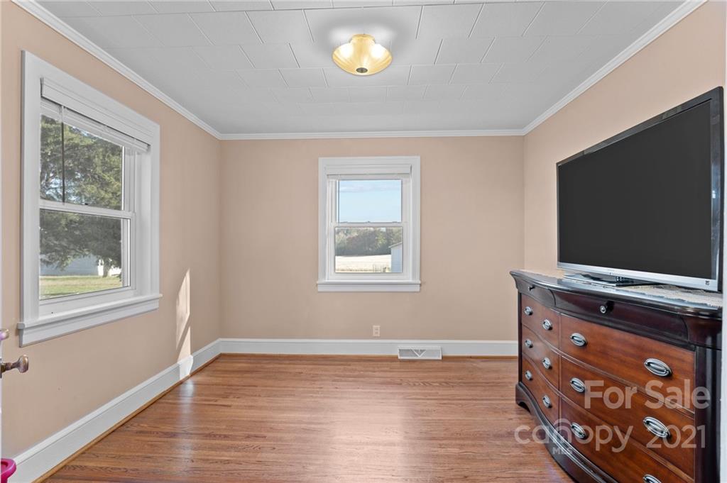 2125 Stack Road Monroe, NC 28112 - Photo 17 of 38 a living room with window and flat screen tv