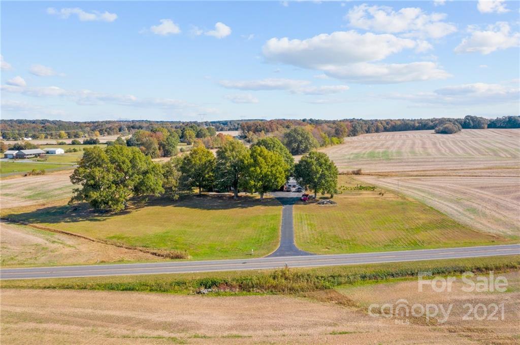 2125 Stack Road Monroe, NC 28112 - Photo 23 of 38 a view of a lake with a beach