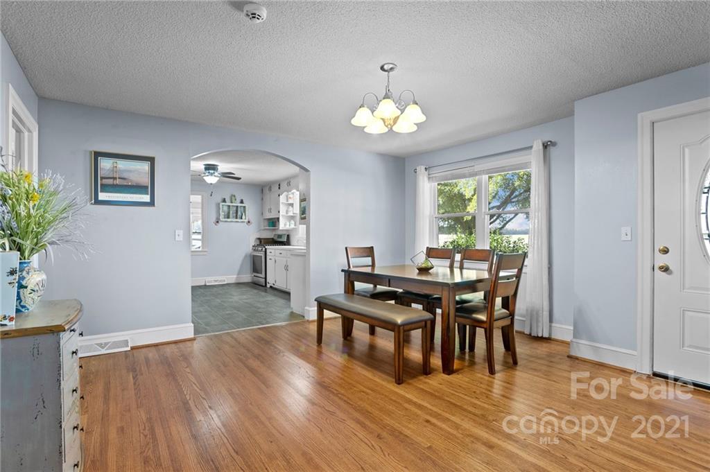 2125 Stack Road Monroe, NC 28112 - Photo 4 of 38 a view of a dining room with furniture and wooden floor