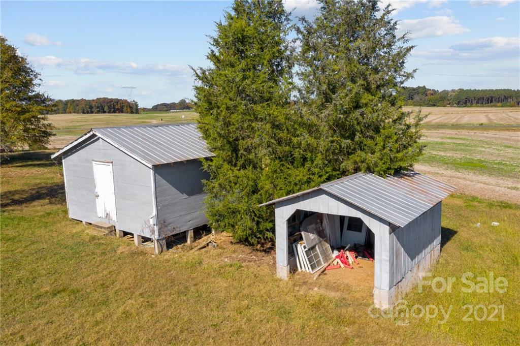 2125 Stack Road Monroe, NC 28112 - Photo 32 of 38 a view of a house with a yard and roof