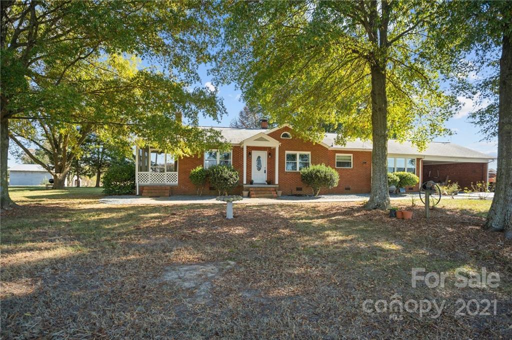 2125 Stack Road Monroe, NC 28112 - Photo 38 of 38 a view of a house with backyard and a tree