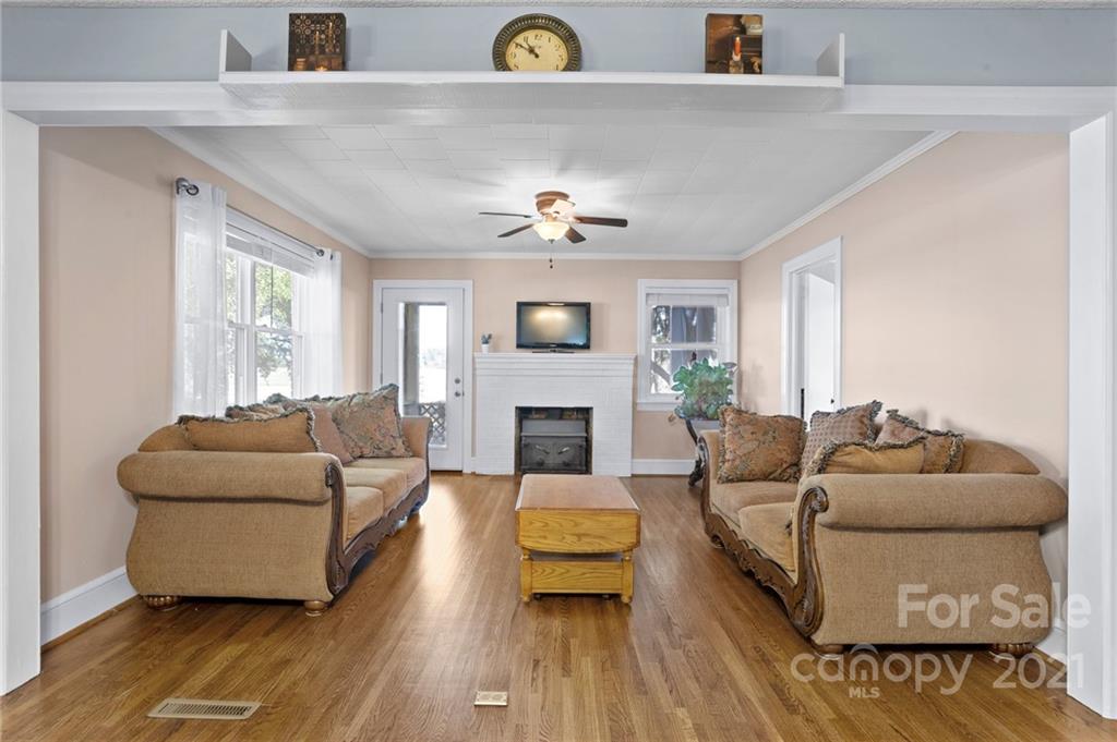 2125 Stack Road Monroe, NC 28112 - Photo 7 of 38 a living room with furniture and a fireplace