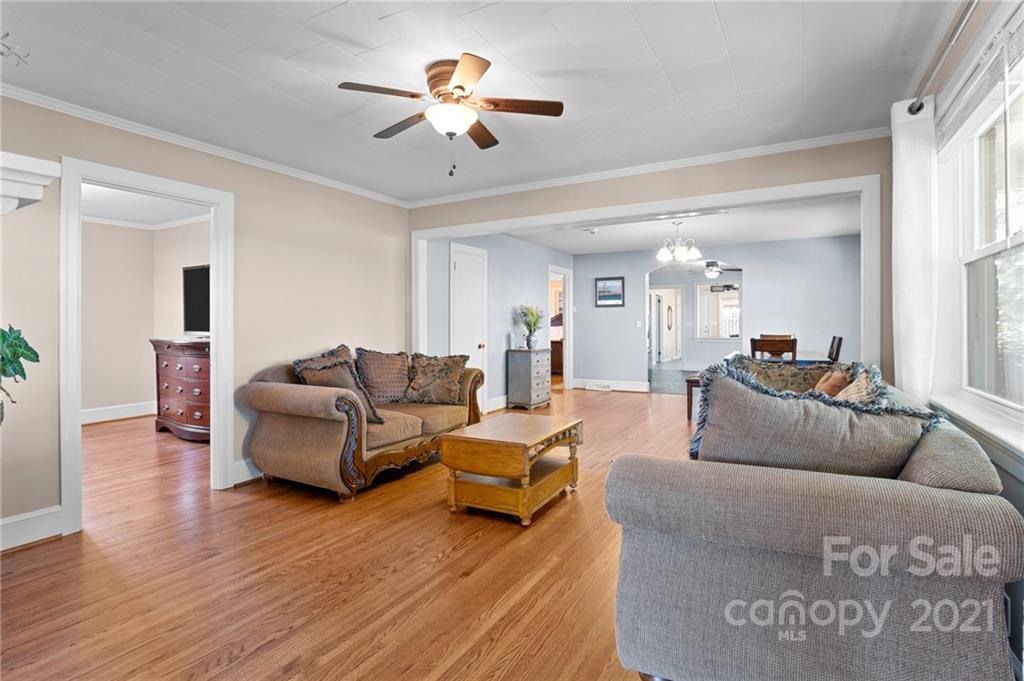 2125 Stack Road Monroe, NC 28112 - Photo 8 of 38 a living room with furniture and a chandelier