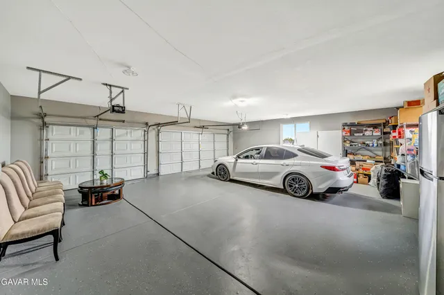 a view of a backyard of the house