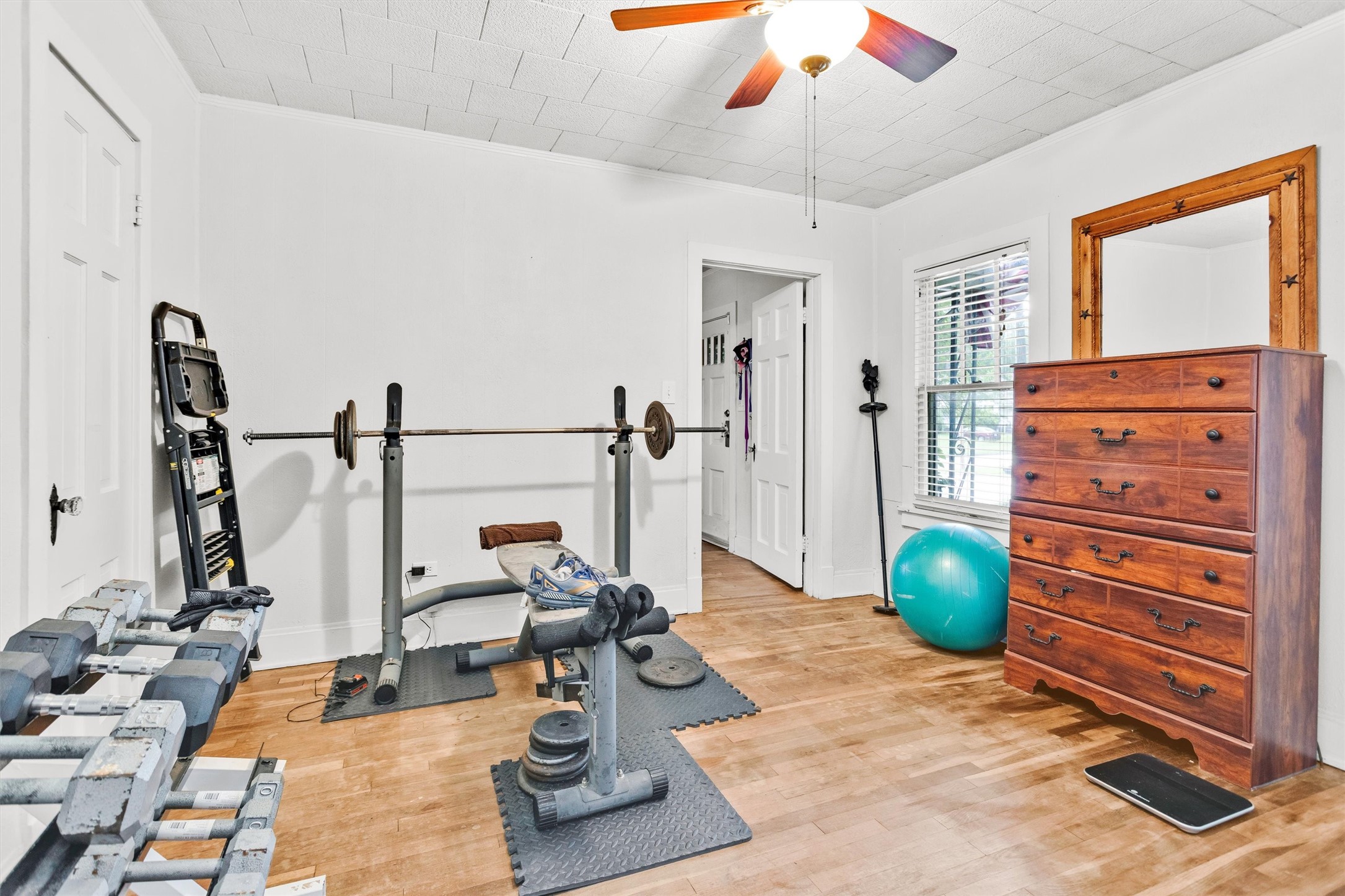 1720 18th Street Huntsville, TX 77340 - Photo 21 of 37 a view of a room with gym equipment