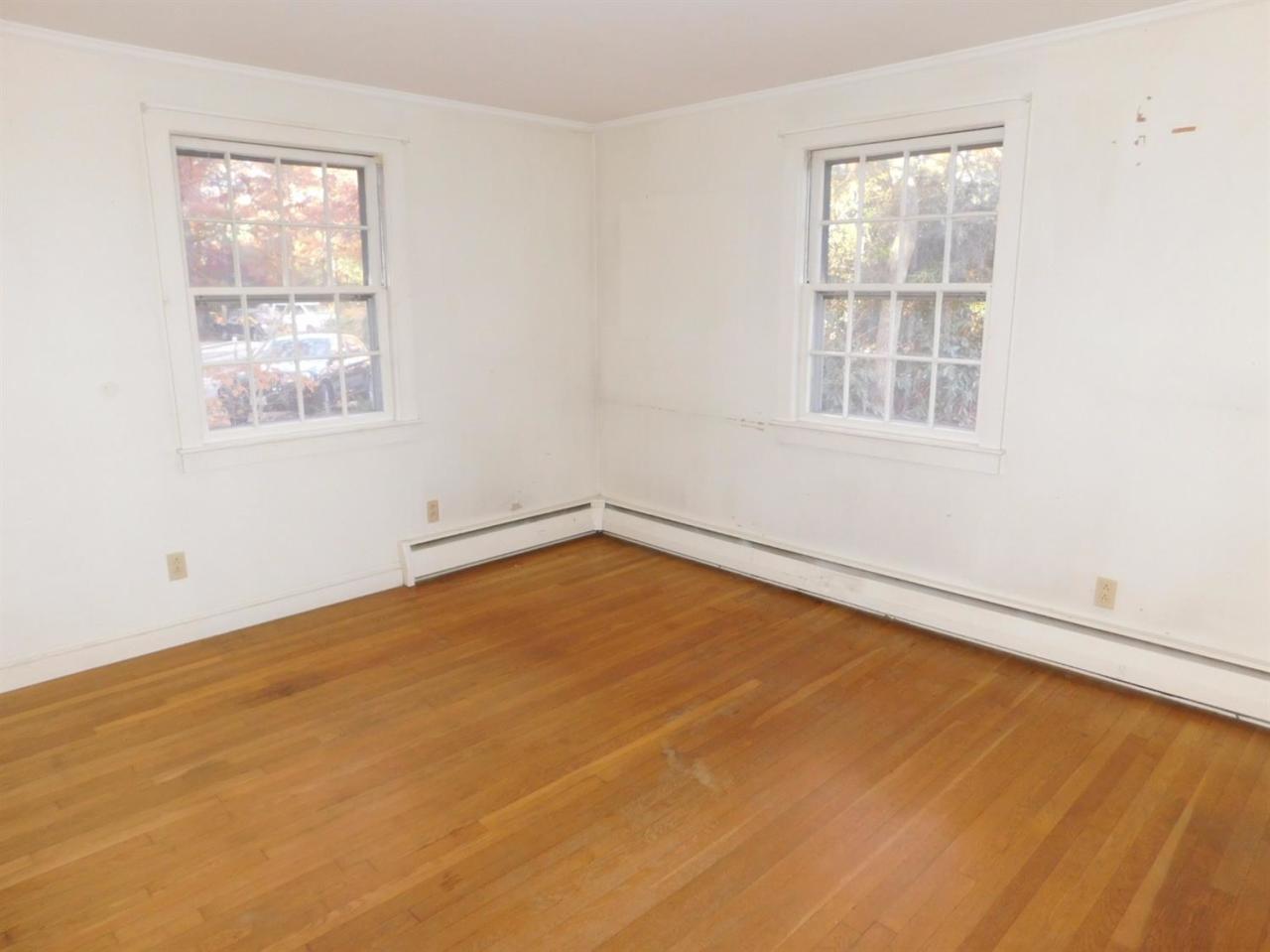 173 Lumbert Mill Road Centerville, MA 02632 - Photo 15 of 17 an empty room with a window
