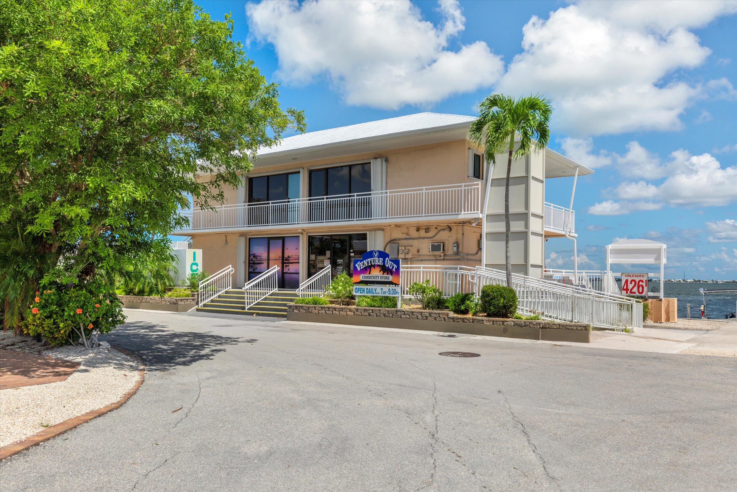 701 Spanish Main Drive, Unit 610 Cudjoe, FL 33042 - Photo 16 of 19 a view of a street with a cars parked in front of it