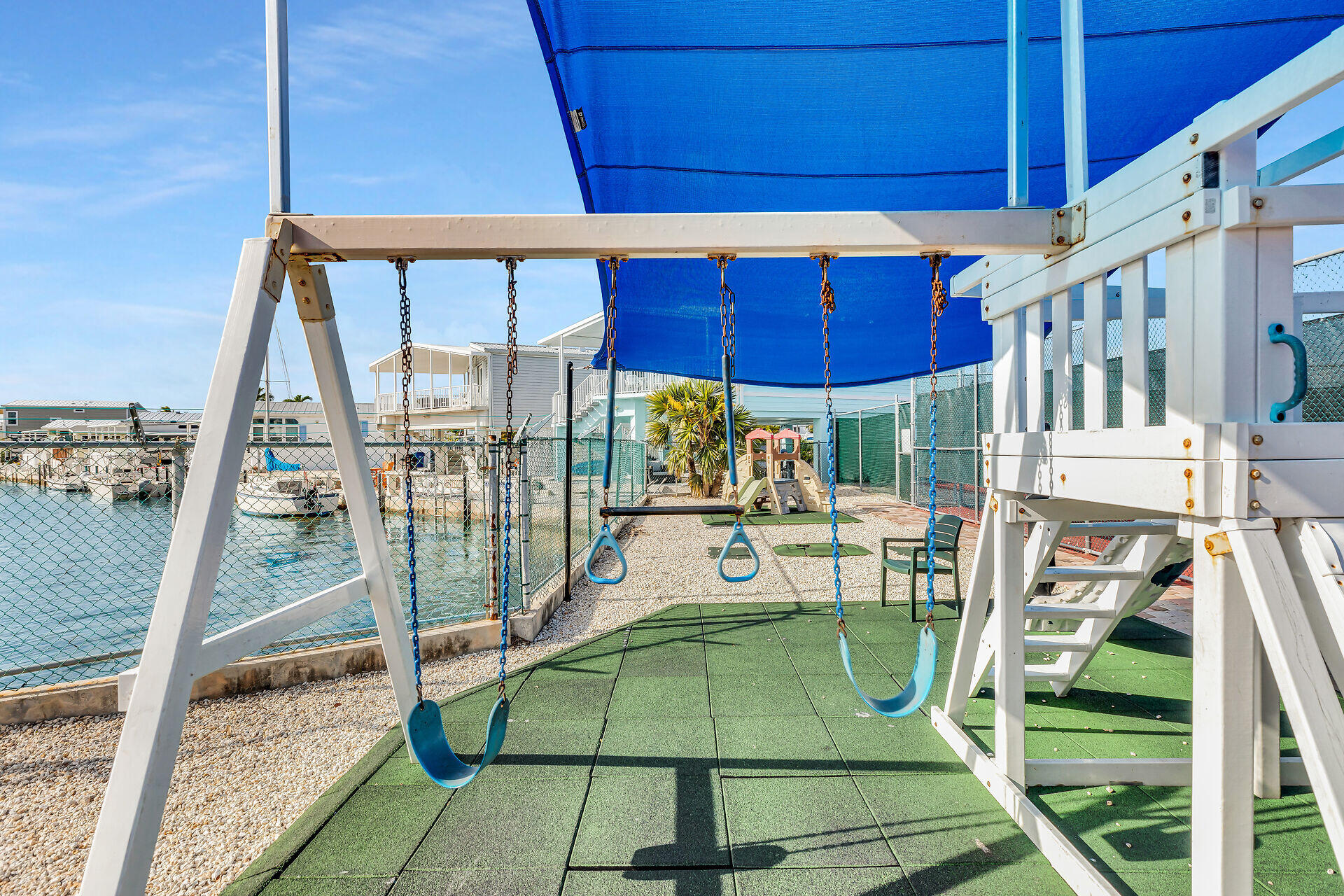 701 Spanish Main Drive, Unit 610 Cudjoe, FL 33042 - Photo 18 of 19 a view of a chairs and table in the patio