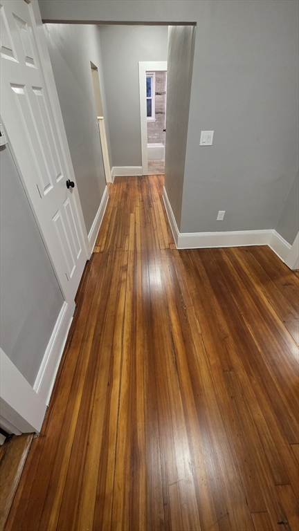 10 Itasca Street, Unit 3 Boston, MA 02126 - Photo 2 of 14 a view of wooden floor in a room