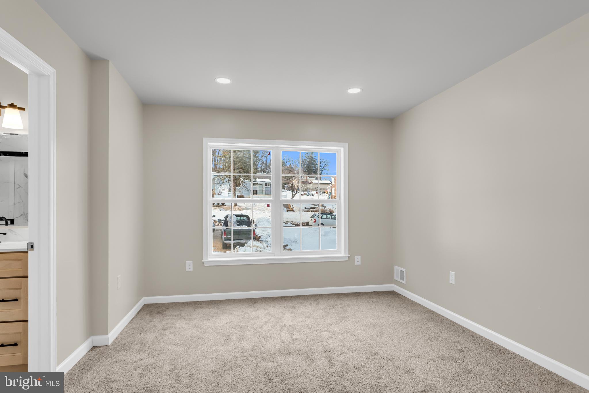 1716 Liggett Avenue Reading, PA 19607 - Photo 11 of 20 a view of an empty room with a window