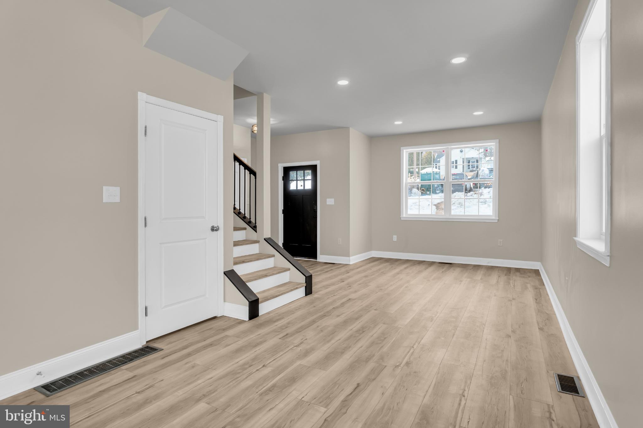 1716 Liggett Avenue Reading, PA 19607 - Photo 10 of 20 an empty room with wooden floor and windows