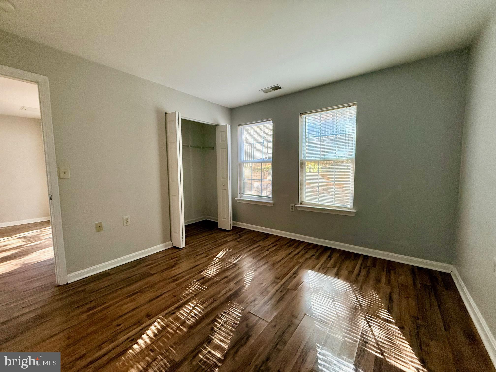 13621 Garfield Place, Unit 102 Woodbridge, VA 22191 - Photo 9 of 14 a view of an empty room and window