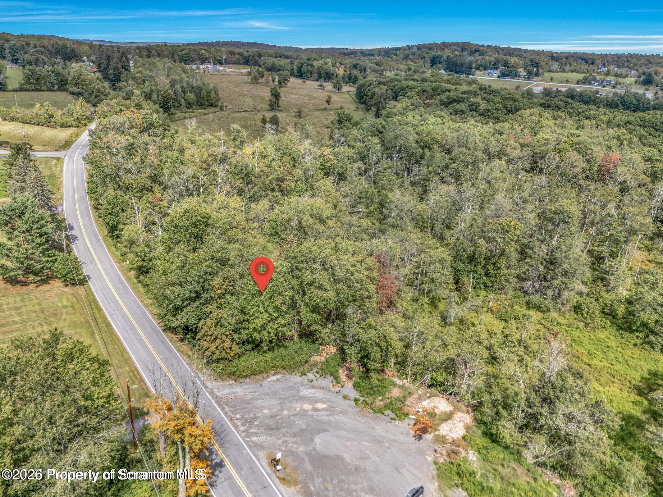 Wesser Rd Spring Brook Moscow, PA 18444 - Photo 2 of 6 a view of a yard with an outdoor seating