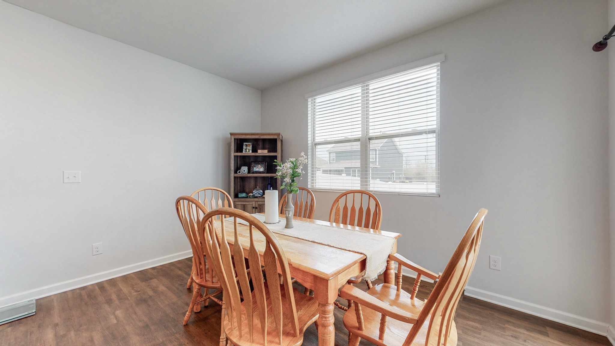 8012 Craighead Drive Lebanon, TN 37087 - Photo 12 of 53 a view of a dining room with furniture window and wooden floor