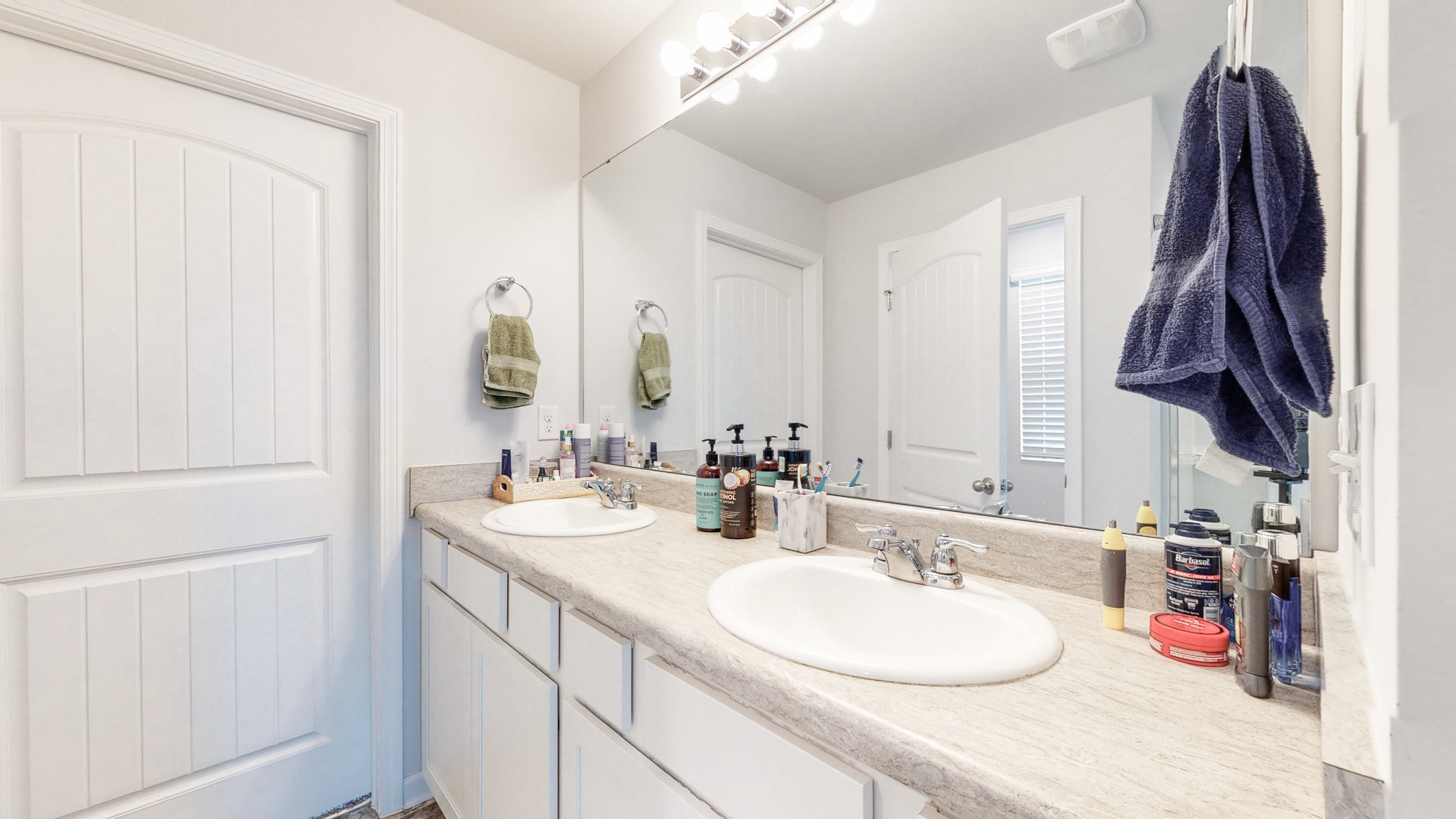 8012 Craighead Drive Lebanon, TN 37087 - Photo 19 of 53 a bathroom with a sink vanity and a mirror