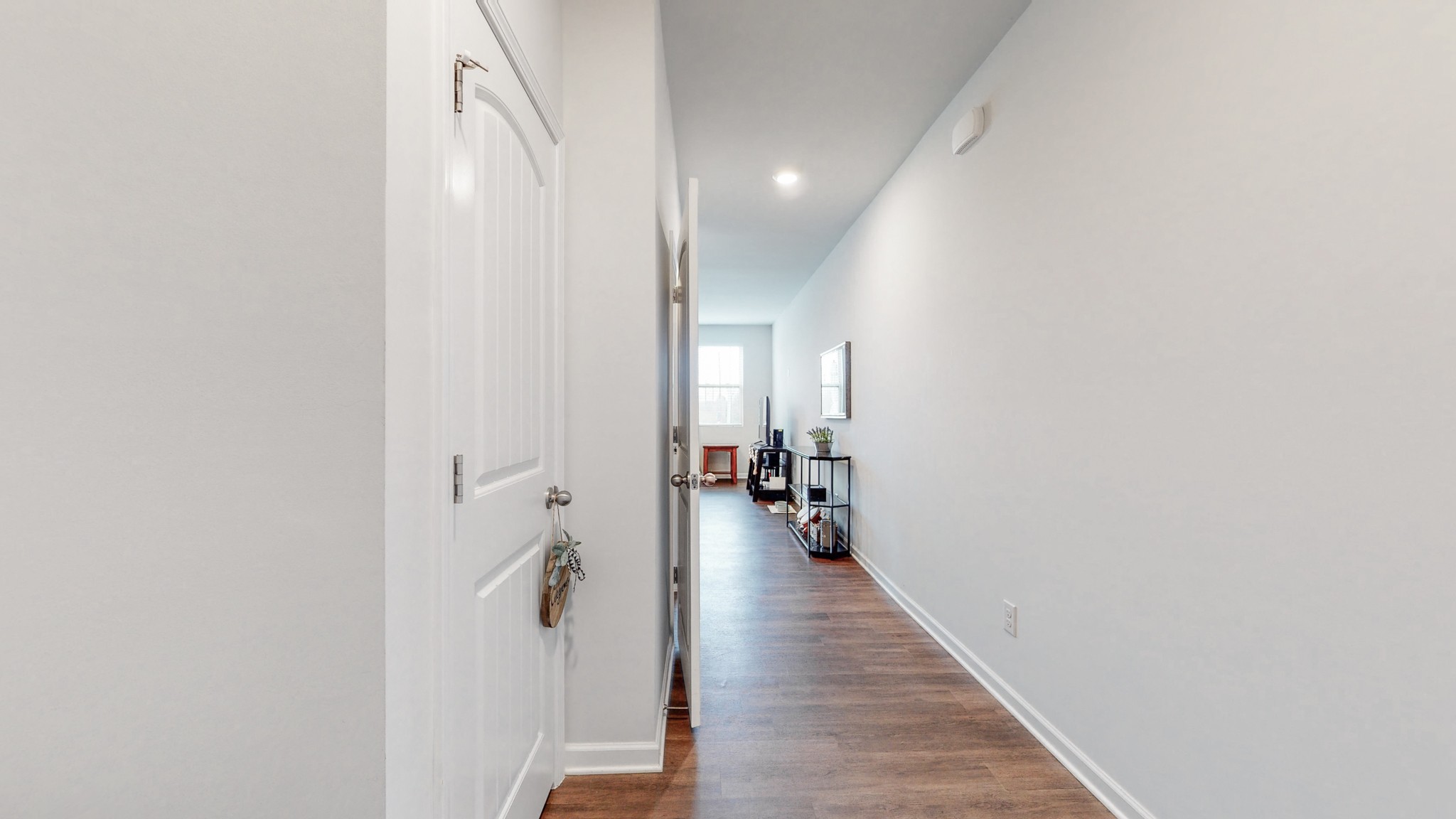 8012 Craighead Drive Lebanon, TN 37087 - Photo 2 of 53 a view of a hallway with wooden floor and staircase