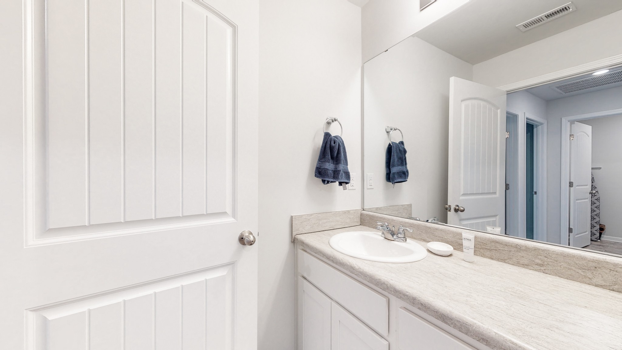 8012 Craighead Drive Lebanon, TN 37087 - Photo 23 of 53 a bathroom with a sink and a mirror