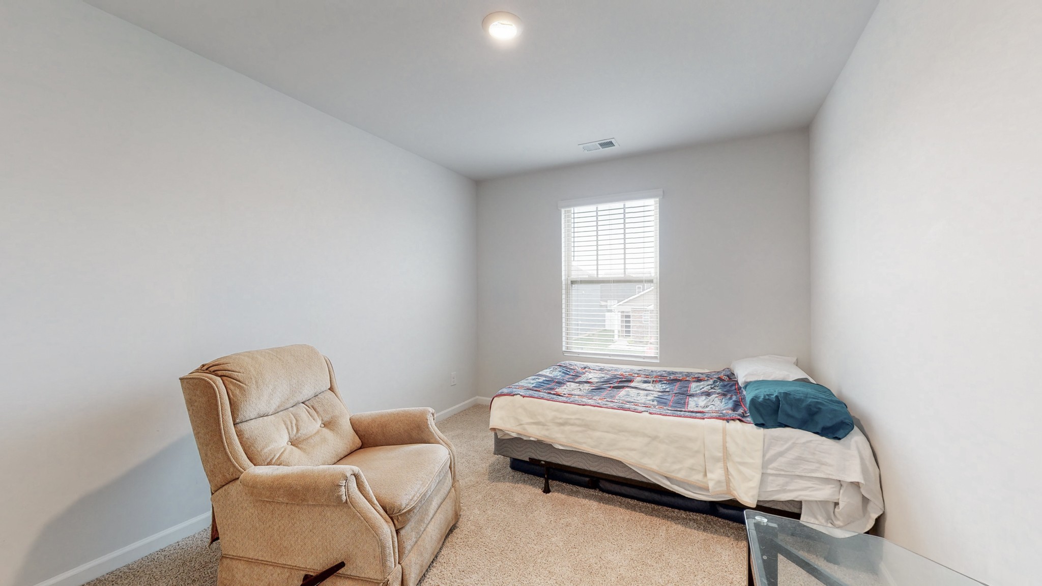 8012 Craighead Drive Lebanon, TN 37087 - Photo 27 of 53 a bedroom with a bed and a chair