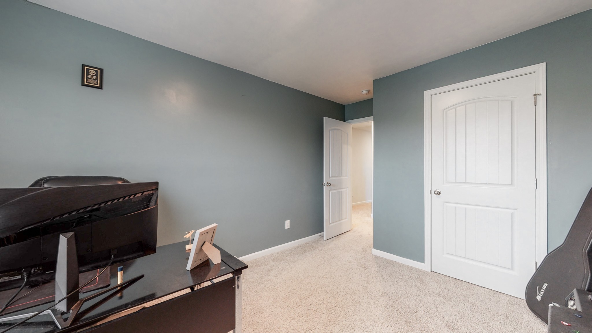 8012 Craighead Drive Lebanon, TN 37087 - Photo 29 of 53 a room with a closet and wooden floor