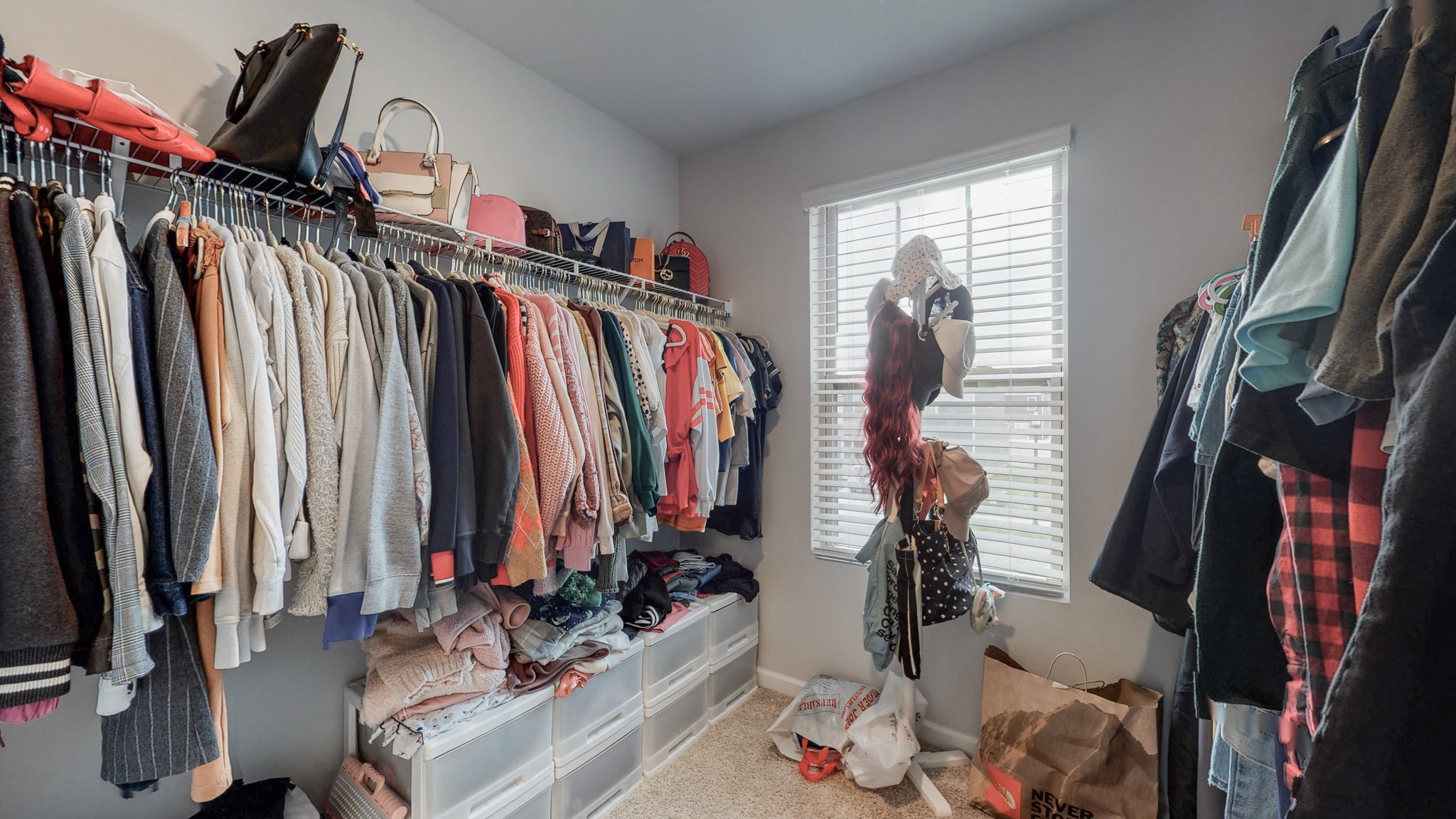 8012 Craighead Drive Lebanon, TN 37087 - Photo 33 of 53 a view of walk in closet with clothes