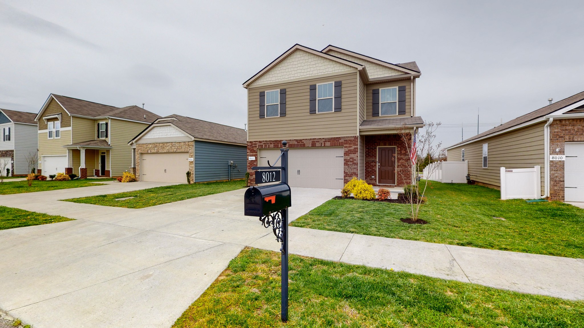 8012 Craighead Drive Lebanon, TN 37087 - Photo 34 of 53 a front view of a house with a yard and garage
