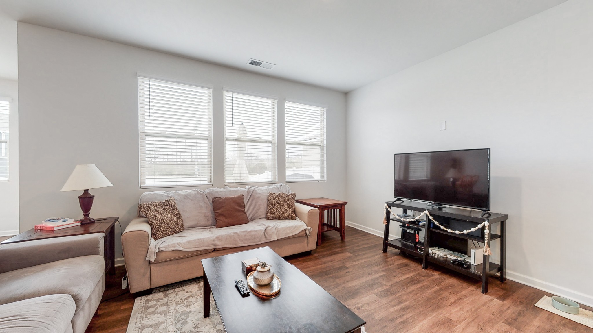 8012 Craighead Drive Lebanon, TN 37087 - Photo 6 of 53 a living room with furniture and a flat screen tv