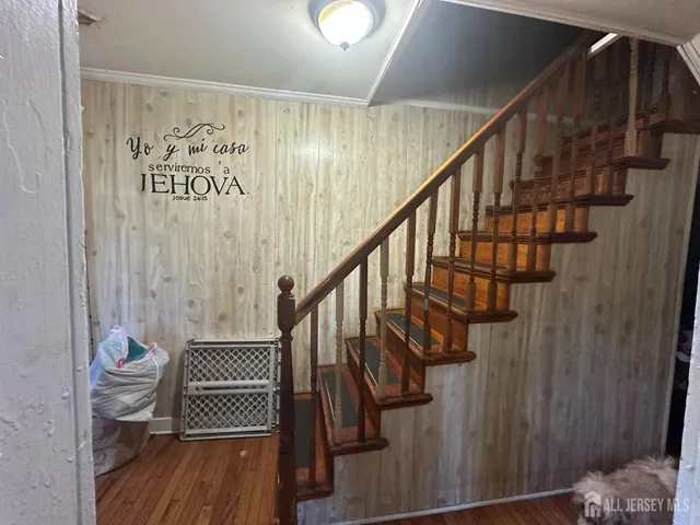 a view of entryway with wooden floor