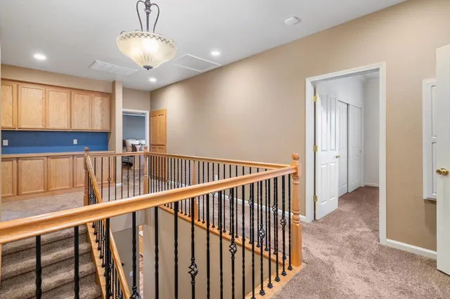 a view of hallway with stairs