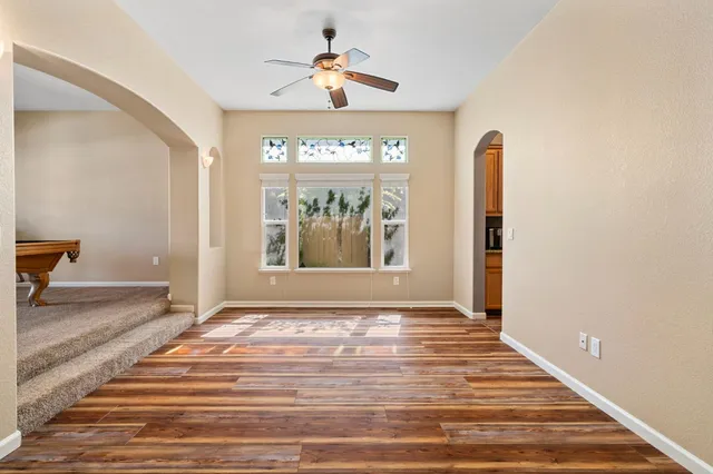 a view of an empty room and window