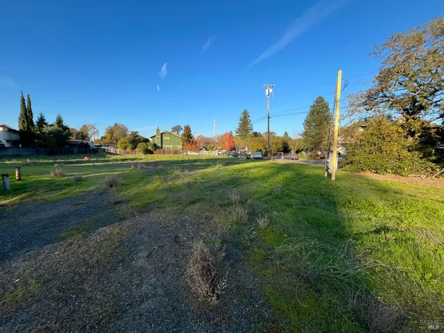 a view of a golf course with a lake
