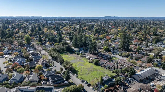 an aerial view of a city with lots of residential buildings