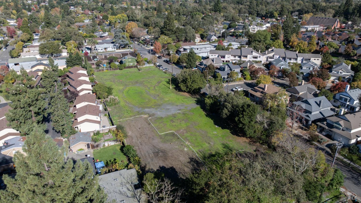 1055 Wright Street Santa Rosa, CA 95404 - Photo 6 of 20 an aerial view of residential houses with outdoor space