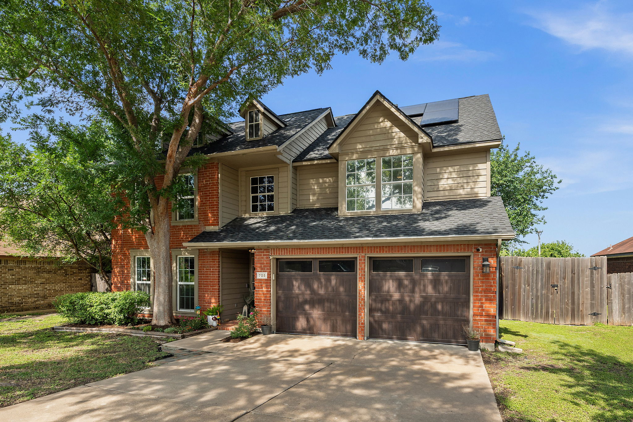 705 Canyon Bend Road Pflugerville, TX 78660 - Photo 2 of 23 a front view of a house with a yard