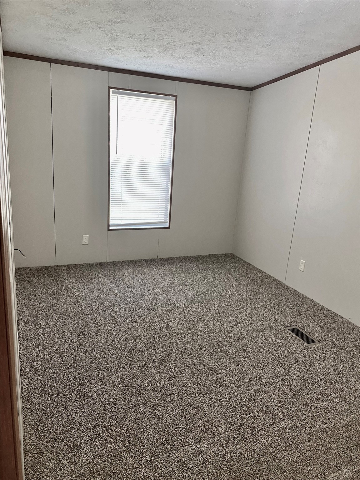 9635 Cedar Ridge Court Willis, TX 77318 - Photo 17 of 25 an empty room with a window