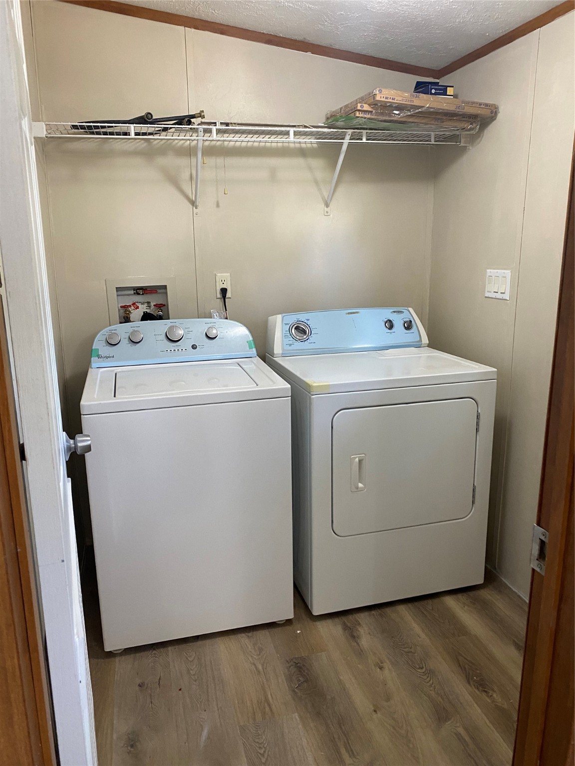 9635 Cedar Ridge Court Willis, TX 77318 - Photo 22 of 25 a utility room with dryer and washer