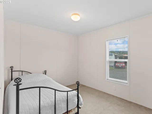 a view of a livingroom with a staircase
