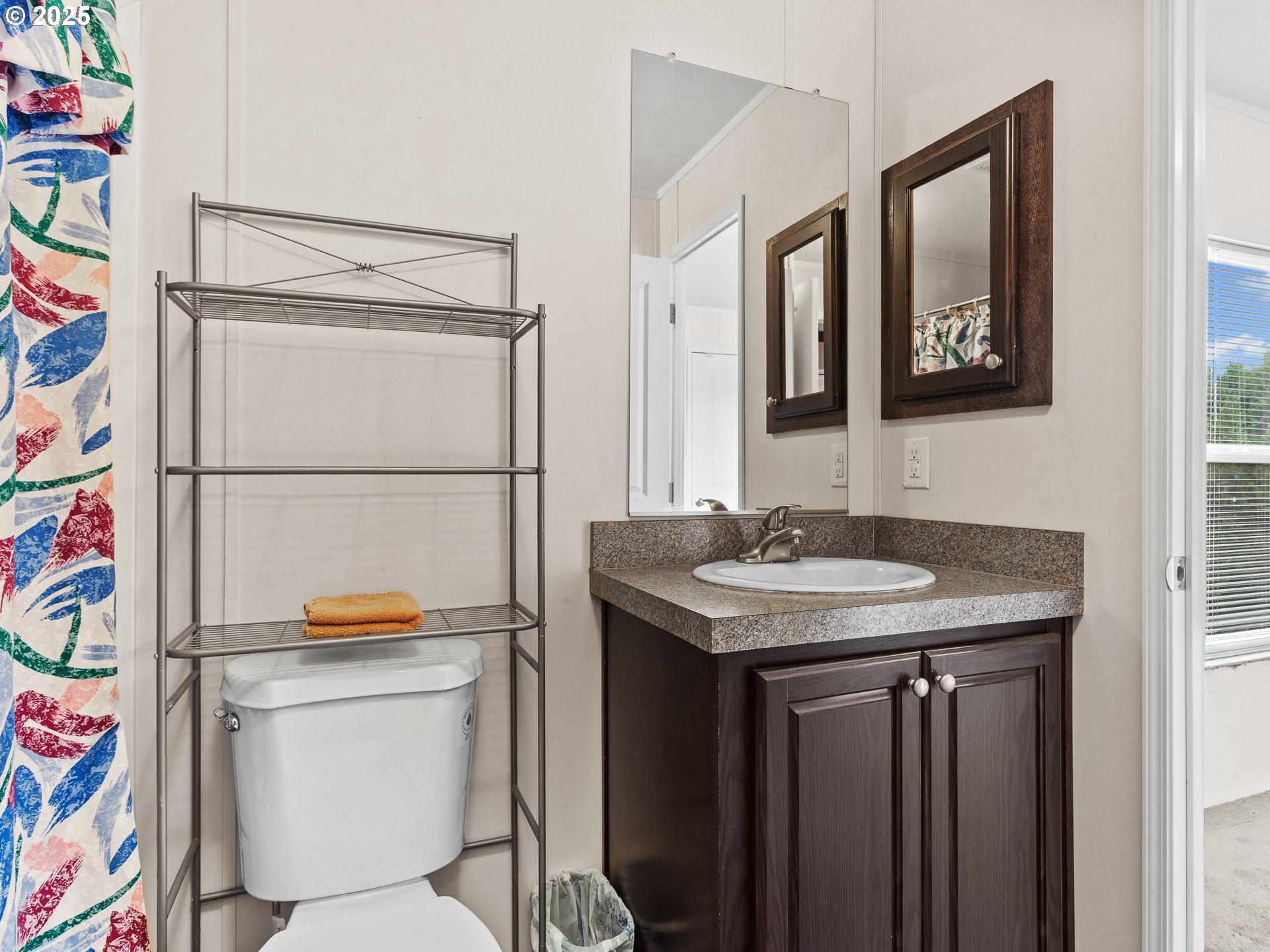 2901 East 2nd Street, Unit 121 Newberg, OR 97132 - Photo 27 of 48 a bathroom with a sink toilet and shower