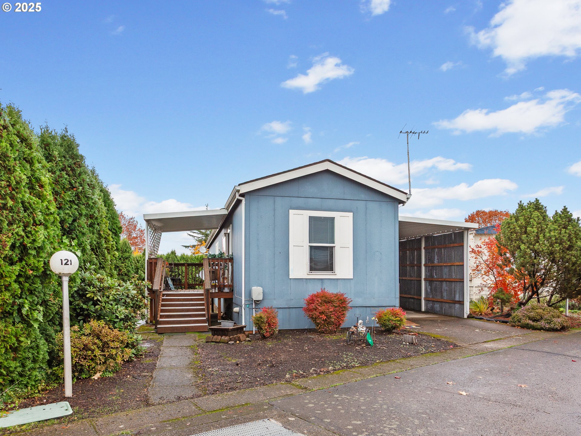 2901 East 2nd Street, Unit 121 Newberg, OR 97132 - Photo 4 of 48 a view of a house with backyard and sitting area