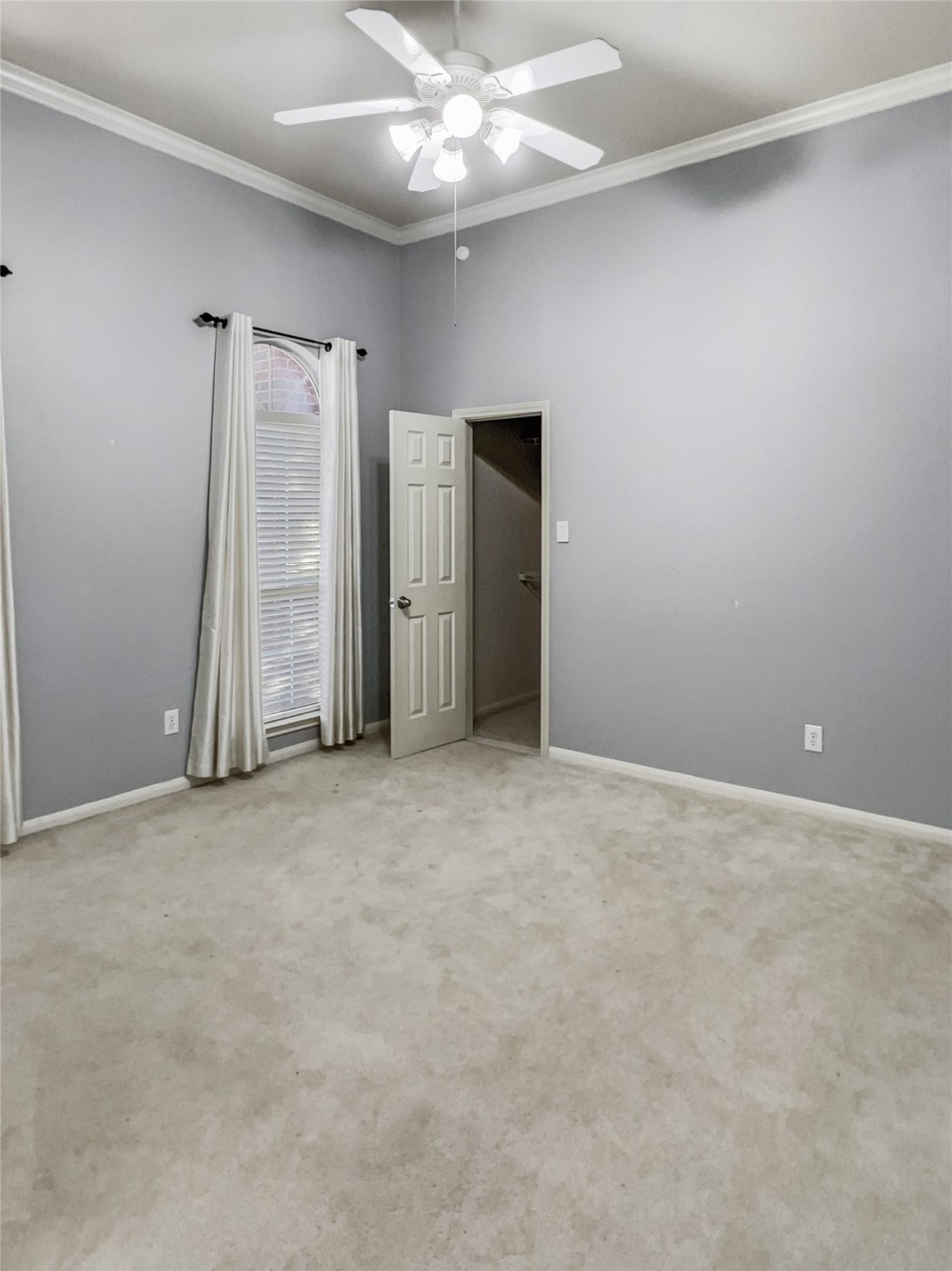 20326 Linshire Drive Spring, TX 77388 - Photo 15 of 24 This oversized secondary bedroom features soft gray walls & high-ceilings, with a reach-in closet, offering ample storage space. French doors lead you into the room, making it versatile enough to be a bedroom or possibly an office.