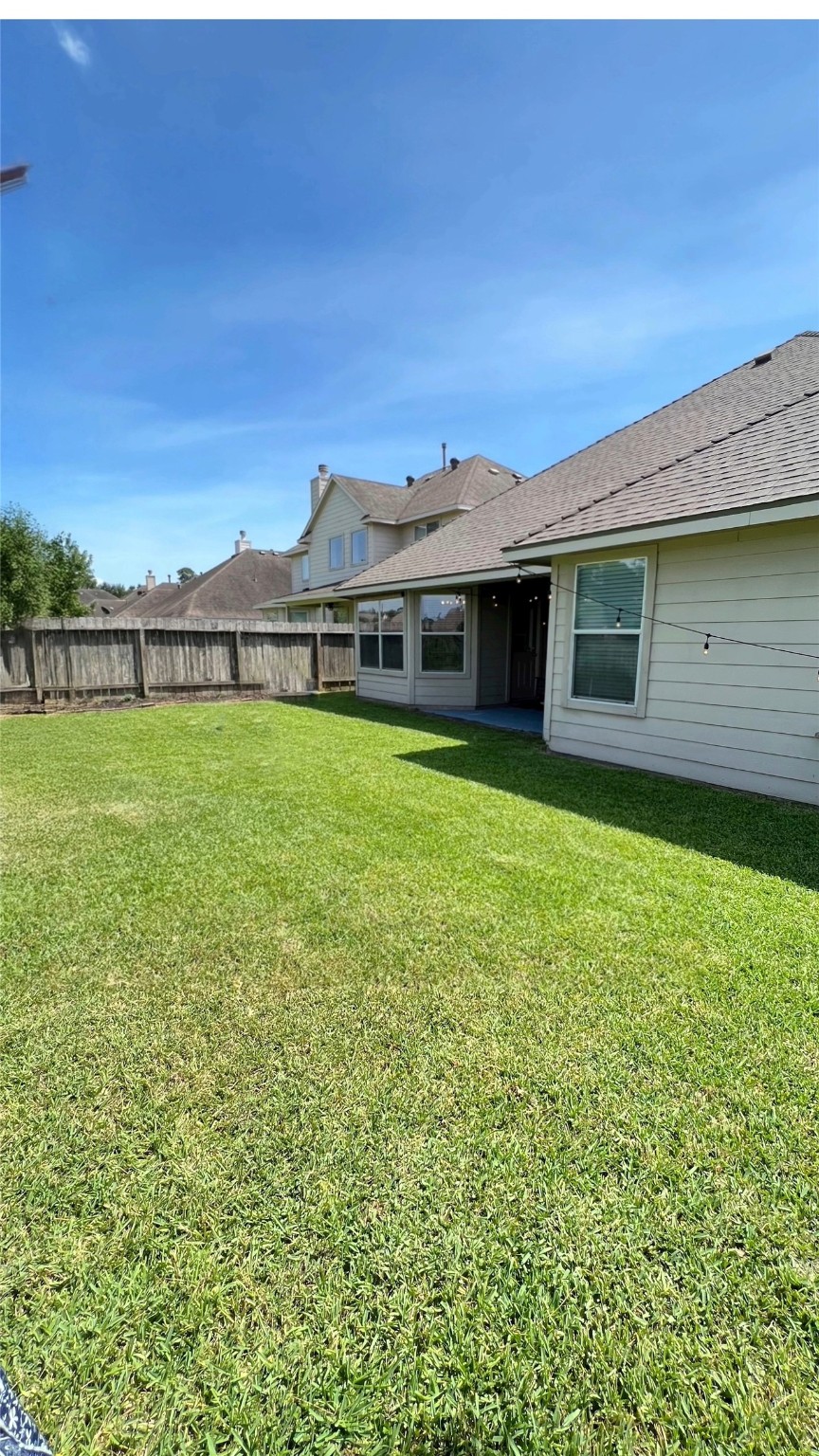 20326 Linshire Drive Spring, TX 77388 - Photo 21 of 24 Spacious, fully-fenced backyard.