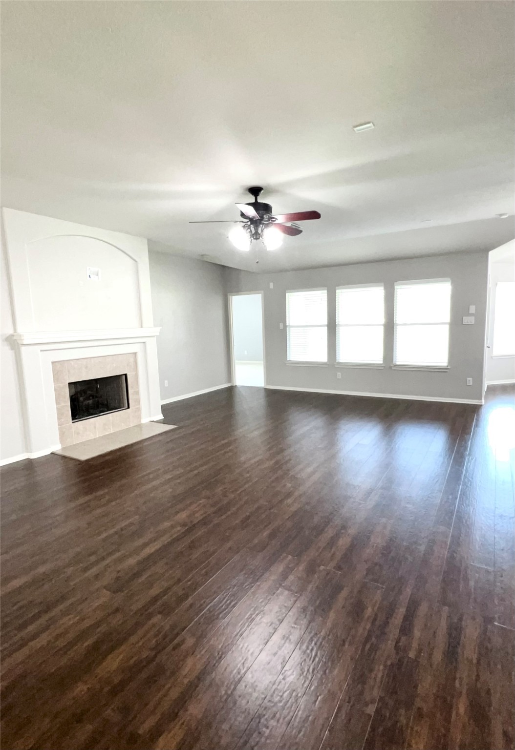 20326 Linshire Drive Spring, TX 77388 - Photo 4 of 24 Generous-sized living room offers a cozy gas fireplace and inviting atmosphere.