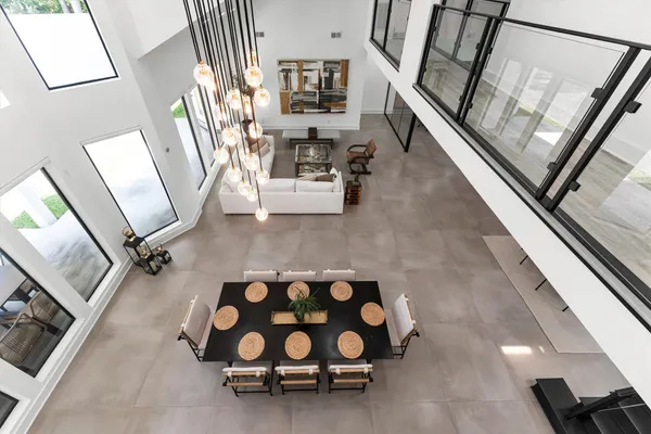 a view of living room with furniture and flat screen tv