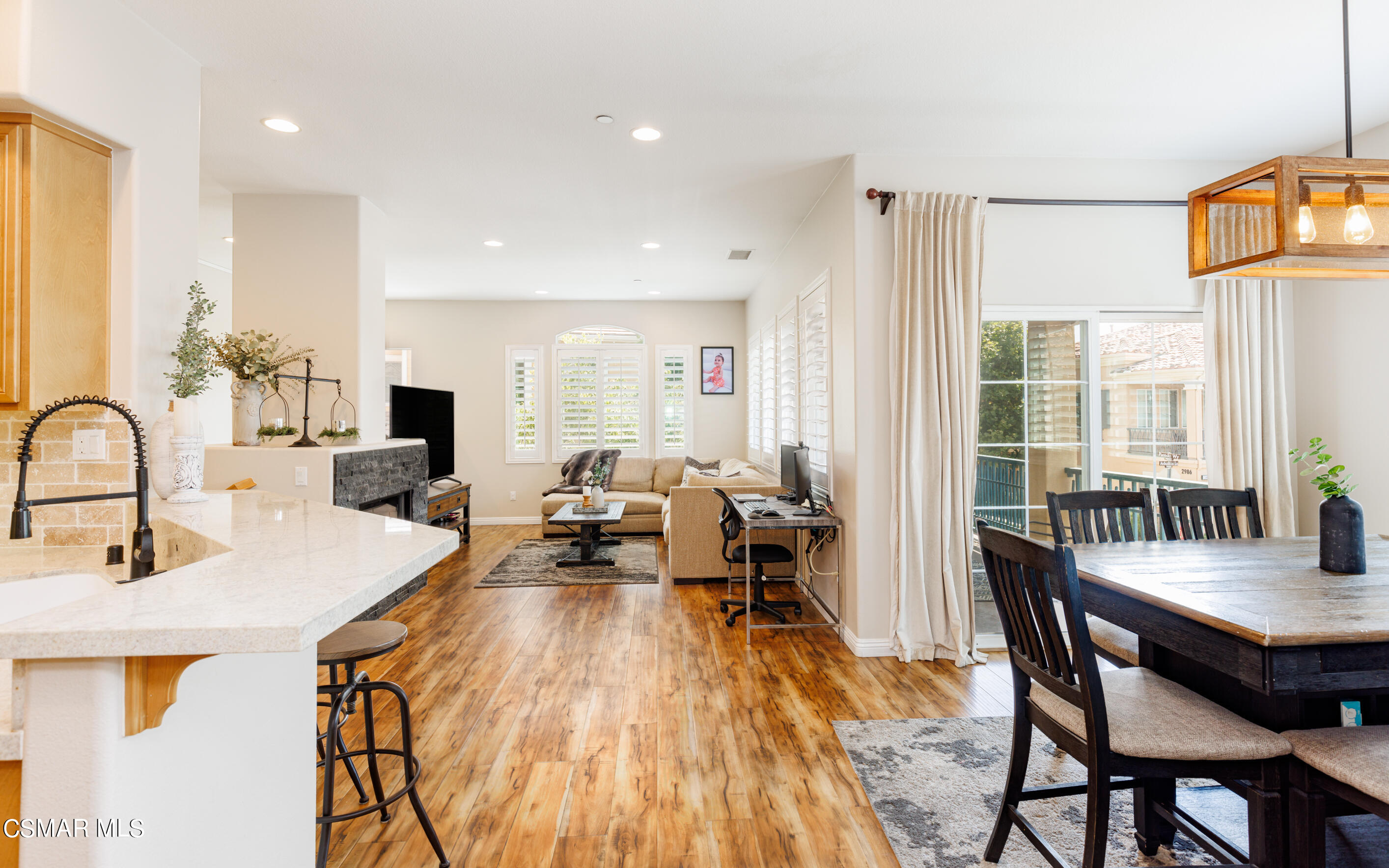4121 Paredo Way, Unit A Simi Valley, CA 93063 - Photo 12 of 29 a dining room with furniture and wooden floor