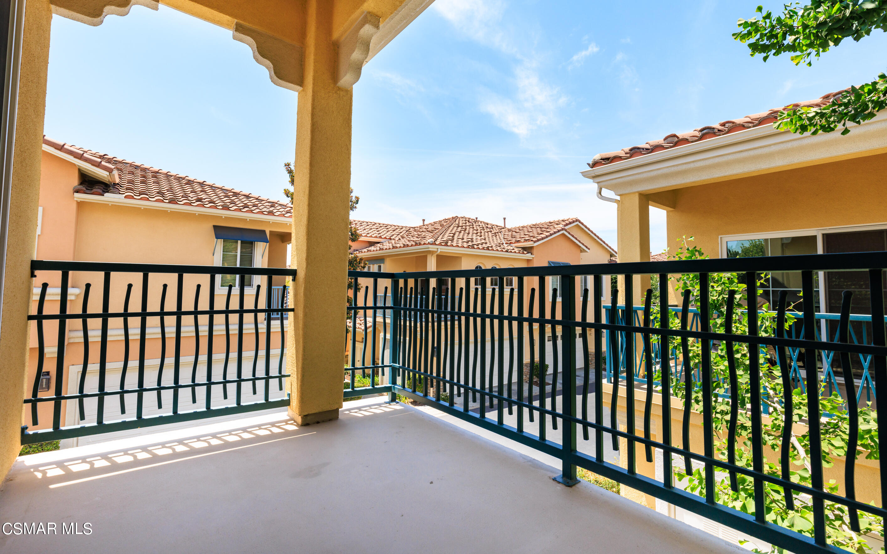4121 Paredo Way, Unit A Simi Valley, CA 93063 - Photo 15 of 29 a view of a balcony with a floor to ceiling window and wooden fence