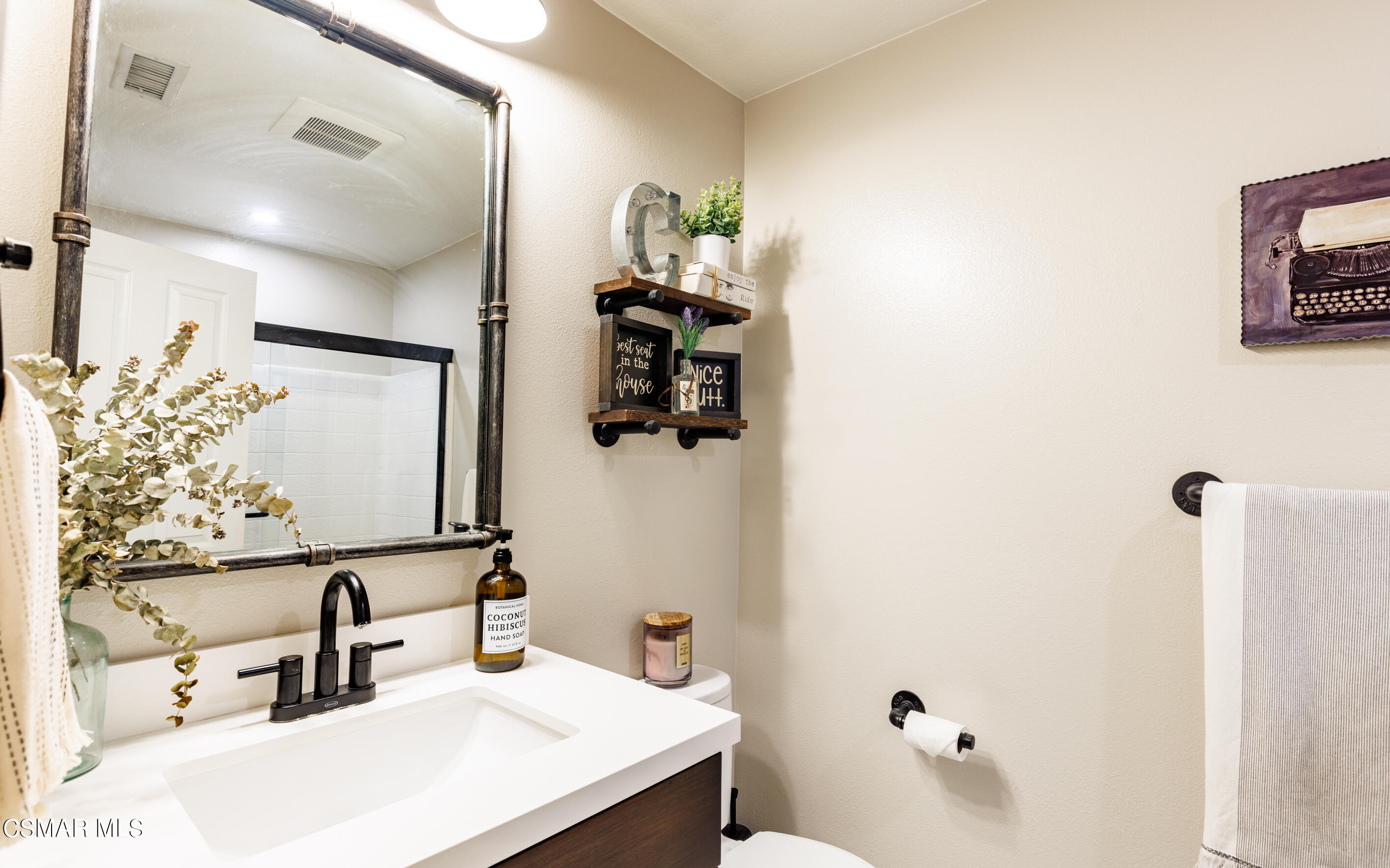 4121 Paredo Way, Unit A Simi Valley, CA 93063 - Photo 20 of 29 a bathroom with a sink and a mirror