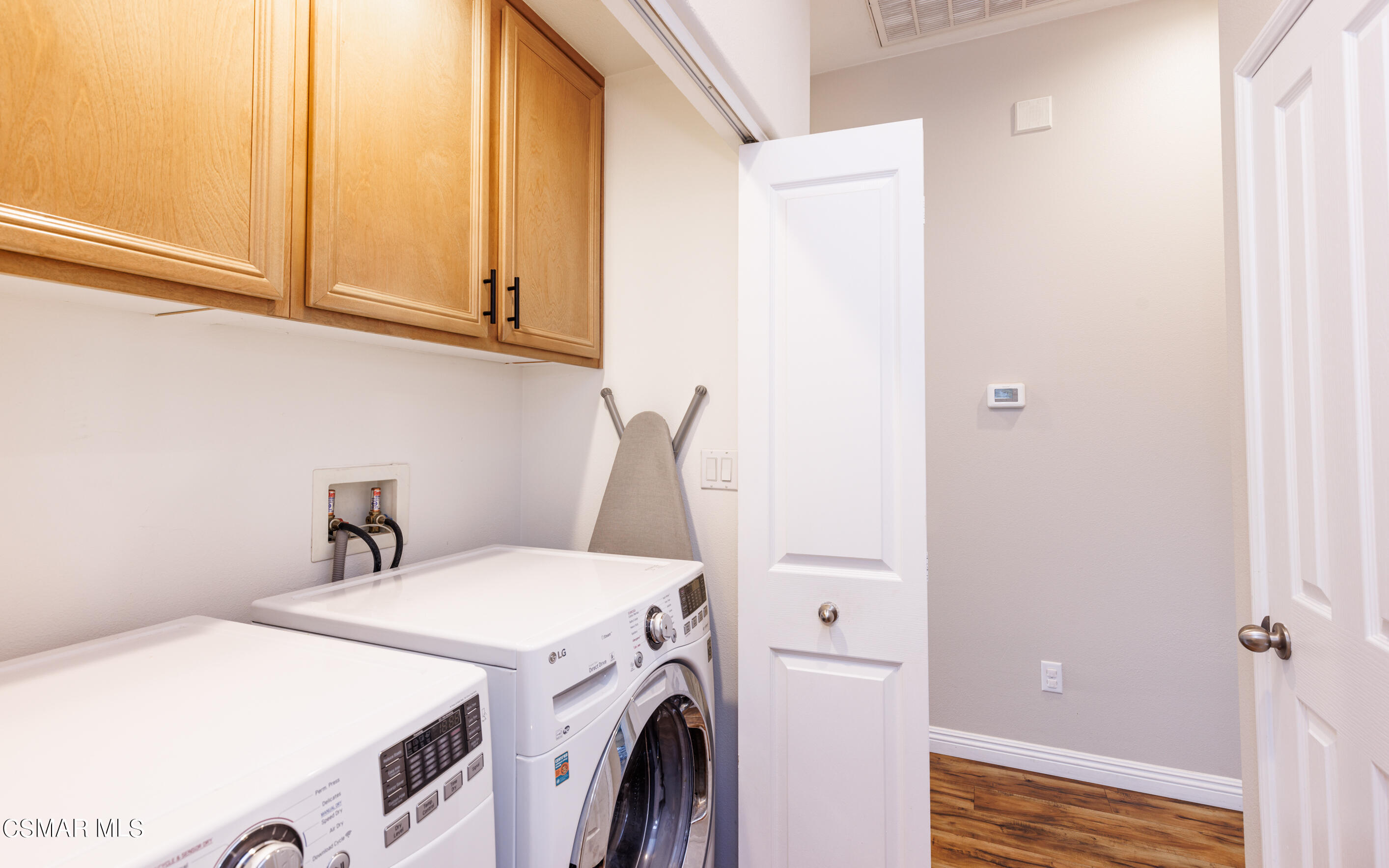 4121 Paredo Way, Unit A Simi Valley, CA 93063 - Photo 22 of 29 a utility room with dryer and washer