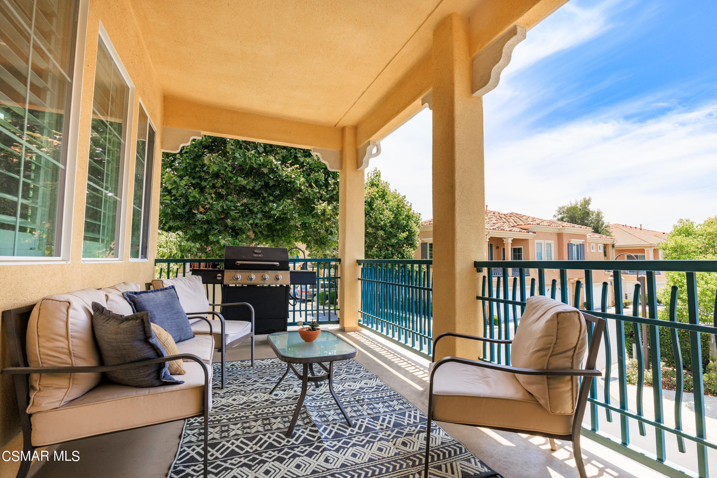 4121 Paredo Way, Unit A Simi Valley, CA 93063 - Photo 23 of 29 a balcony with furniture and a potted plant