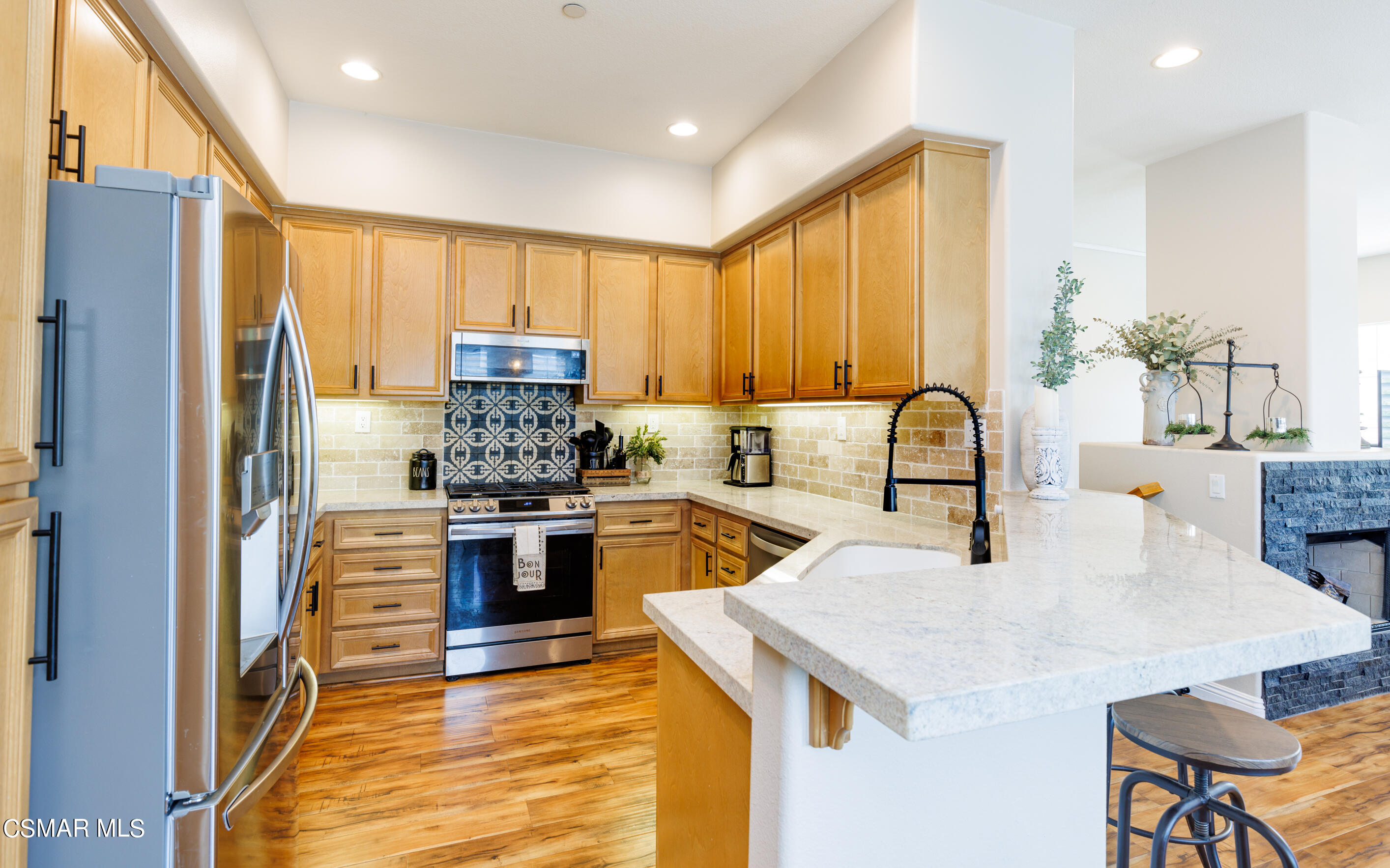 4121 Paredo Way, Unit A Simi Valley, CA 93063 - Photo 3 of 29 a kitchen with a refrigerator sink and stove
