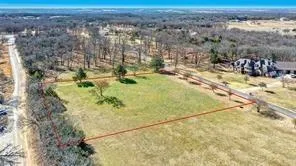 a view of a yard with an outdoor space